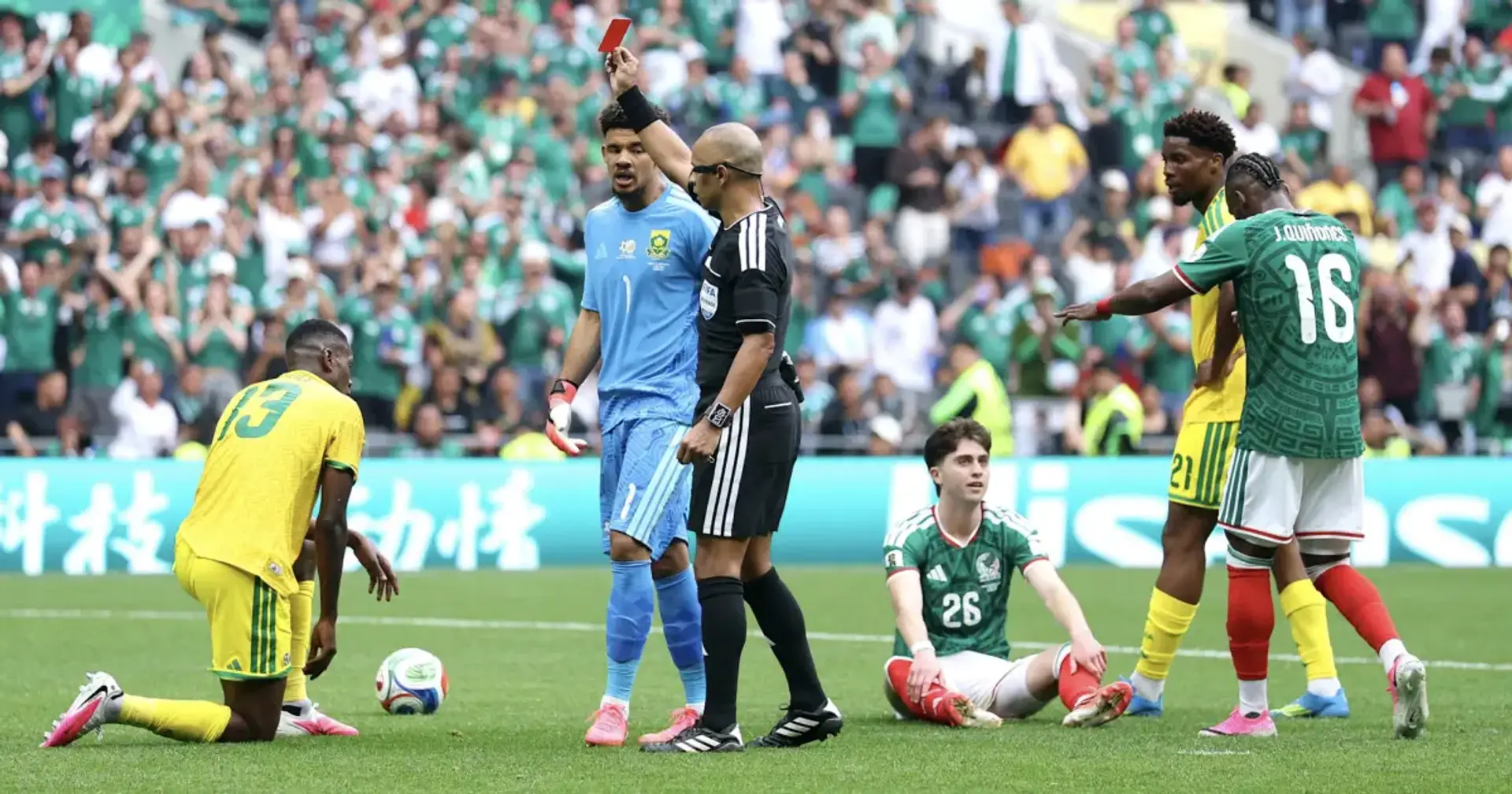 Match referee giving out red card