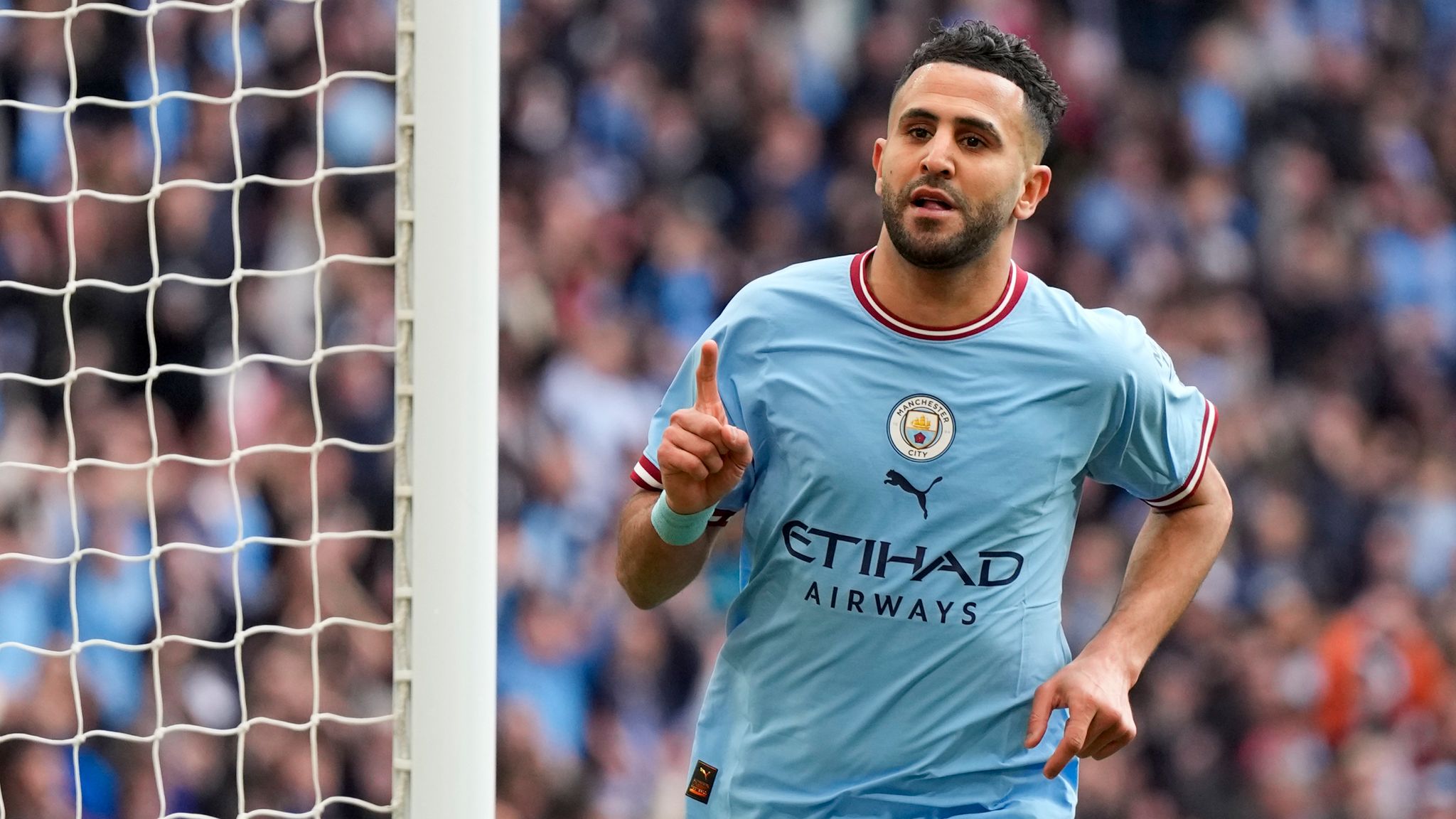 Riyad Mahrez playing for Man City