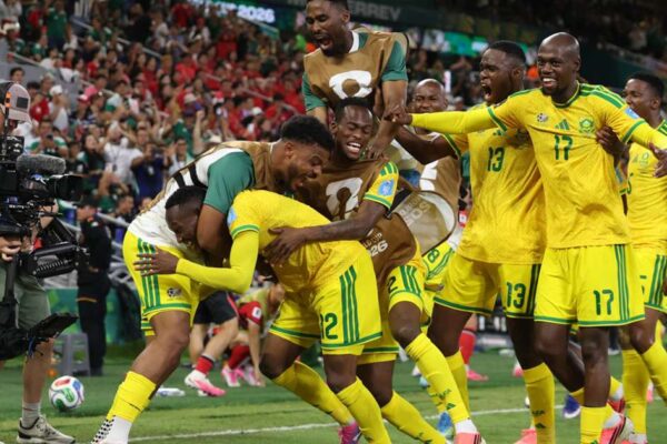 South Africa players celebrating the team's goal against South Korea