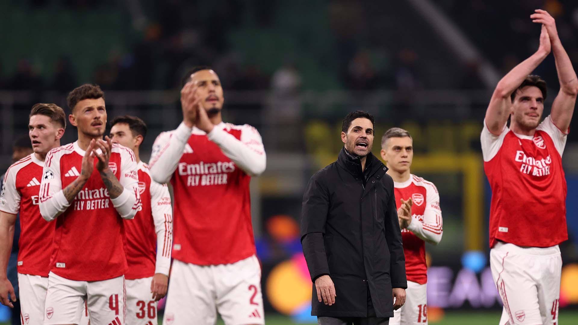 Arsenal players celebrating a victory after defeating Inter Milan in the last seasons champions league